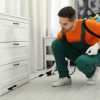 A man providing pest control services in oman